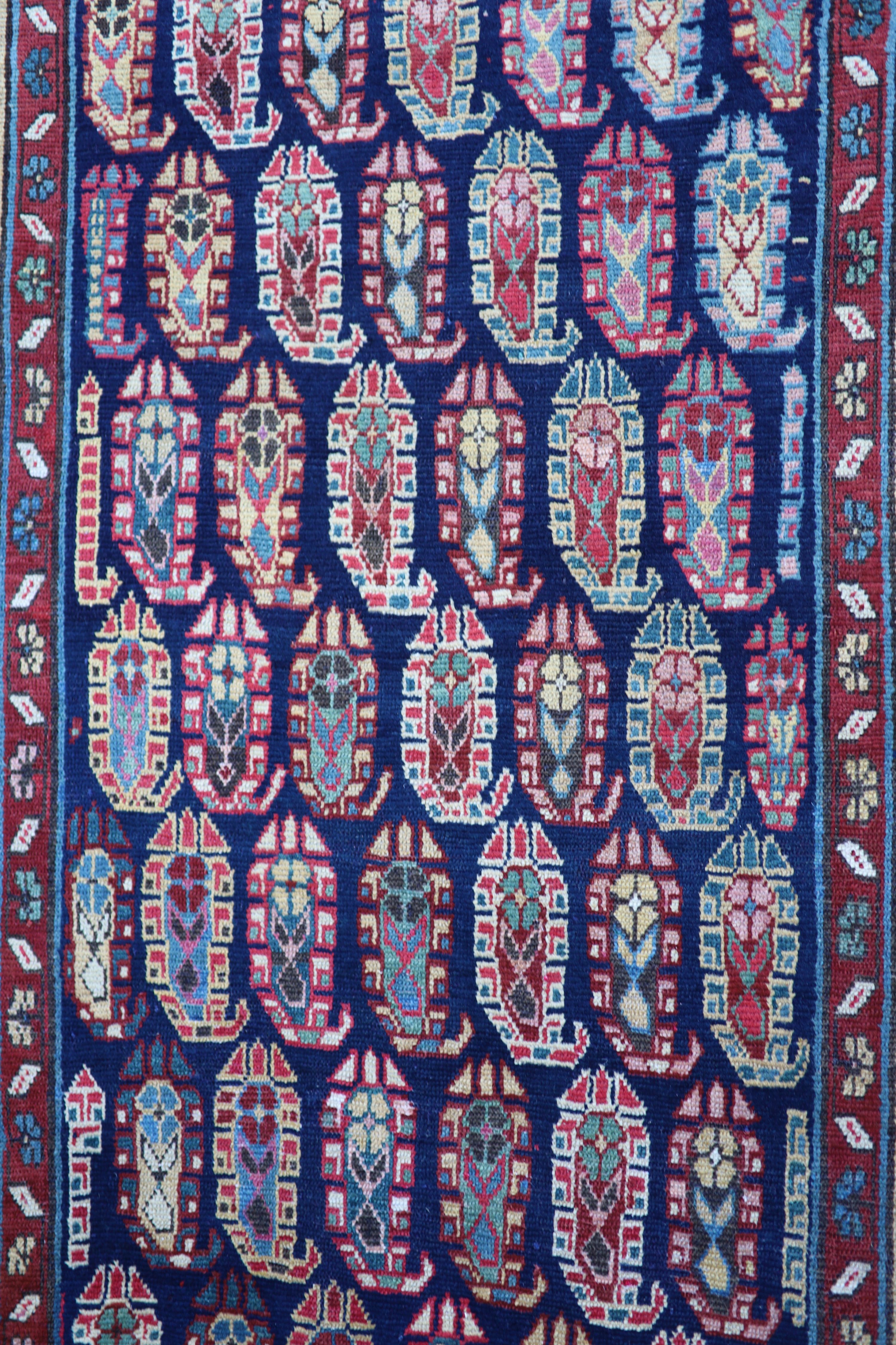 An antique Karabagh blue ground runner, late 19th century 355 x 106